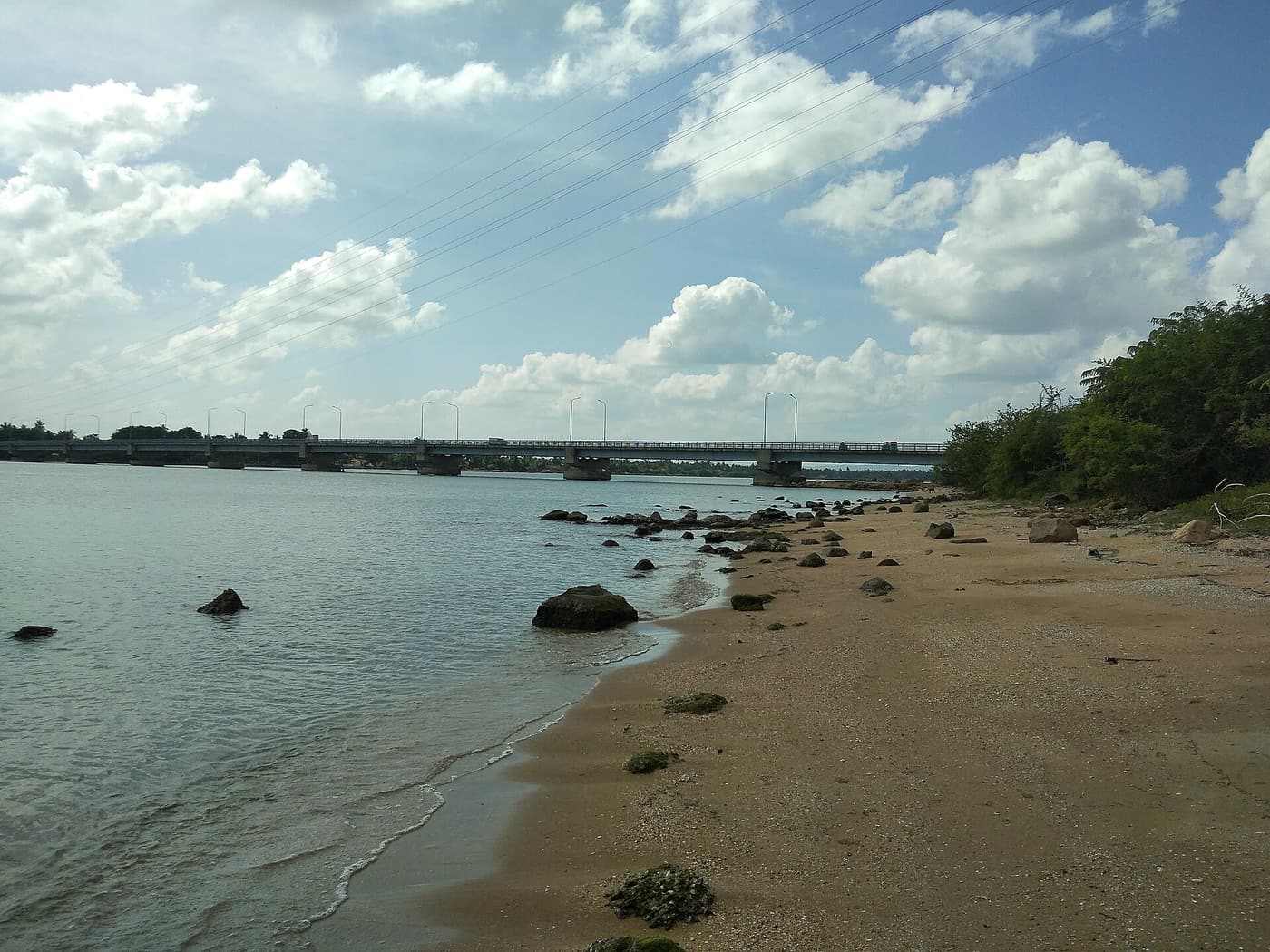 The lagoon shore at Kinniya with the bridge in the distance