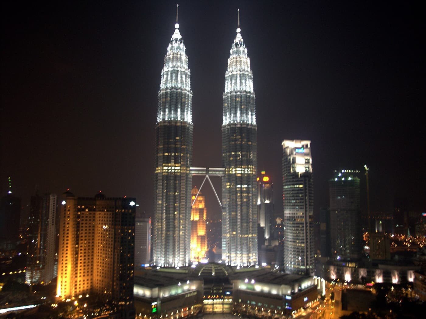 The Petronas Towers in Kuala Lumpur lit up at night